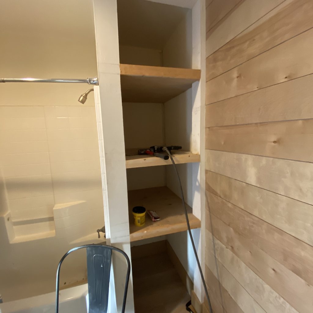 DIY Floating Shelves in modern farmhouse bathroom | The Yellow Rose Farmhouse | www.theyellowrosefarmhouse.com