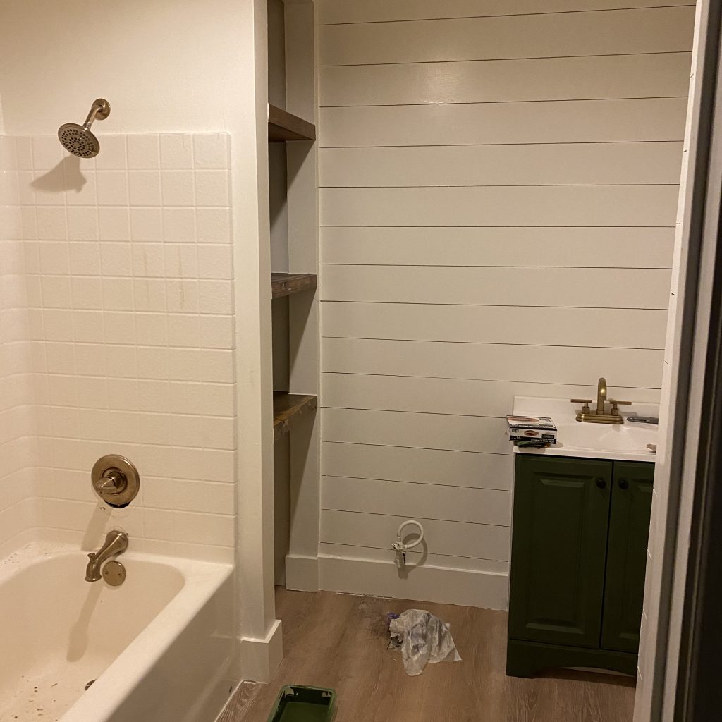 Modern Farmhouse Bathroom remodel with Champagne bronze shower and tub faucets | The Yellow Rose Farmhouse | www.theyellowrosefarmhouse.com